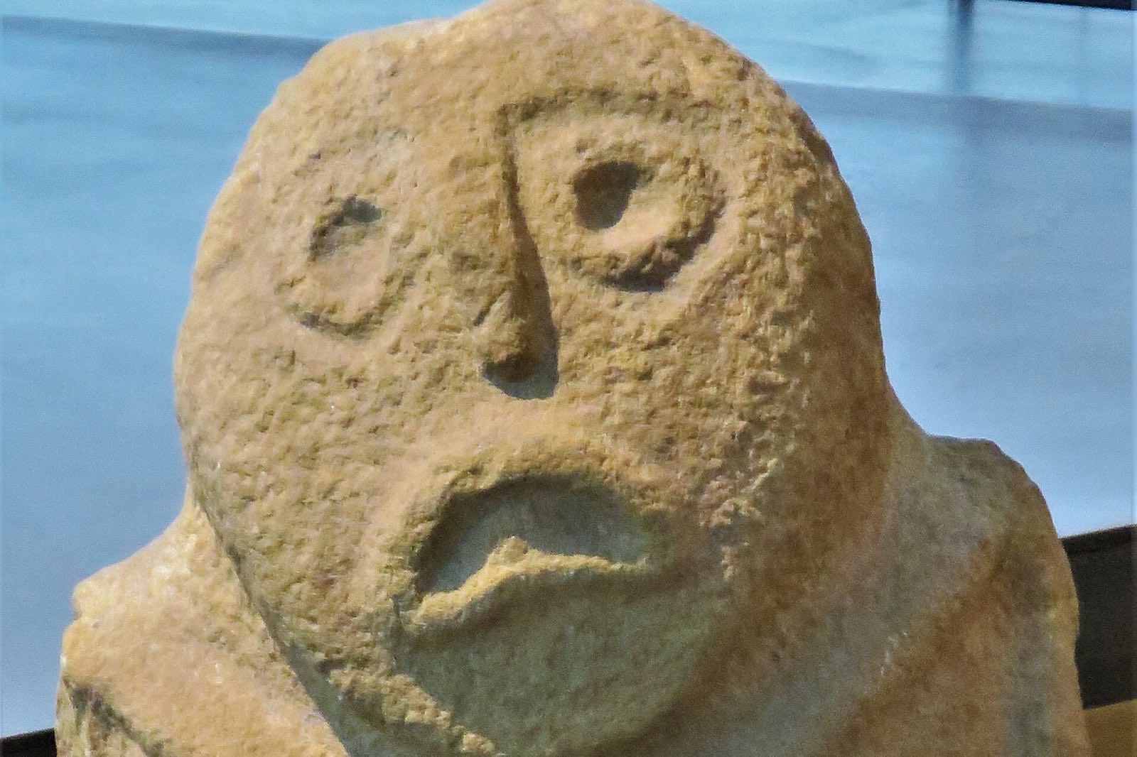 Stone fish-faced sculpture from the excavation